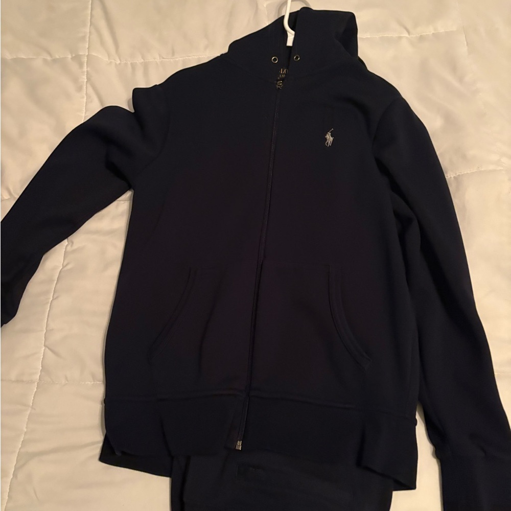 Navy blue polo
Track suit small
Rarely worn